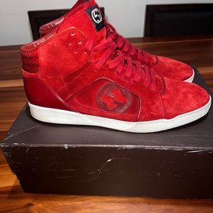 Gucci suede hi tops… good condition…. Needs a slight cleaning to look like new.